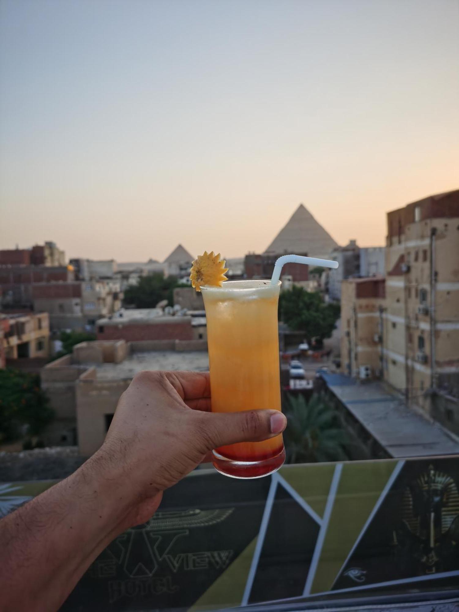 The View Pyramids Hotel Kafret el-Gabal Esterno foto