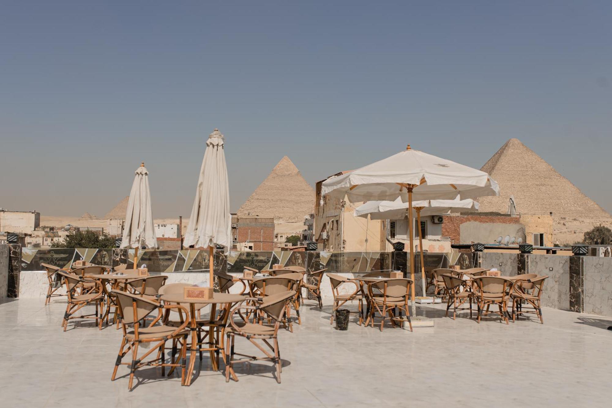 The View Pyramids Hotel Kafret el-Gabal Esterno foto