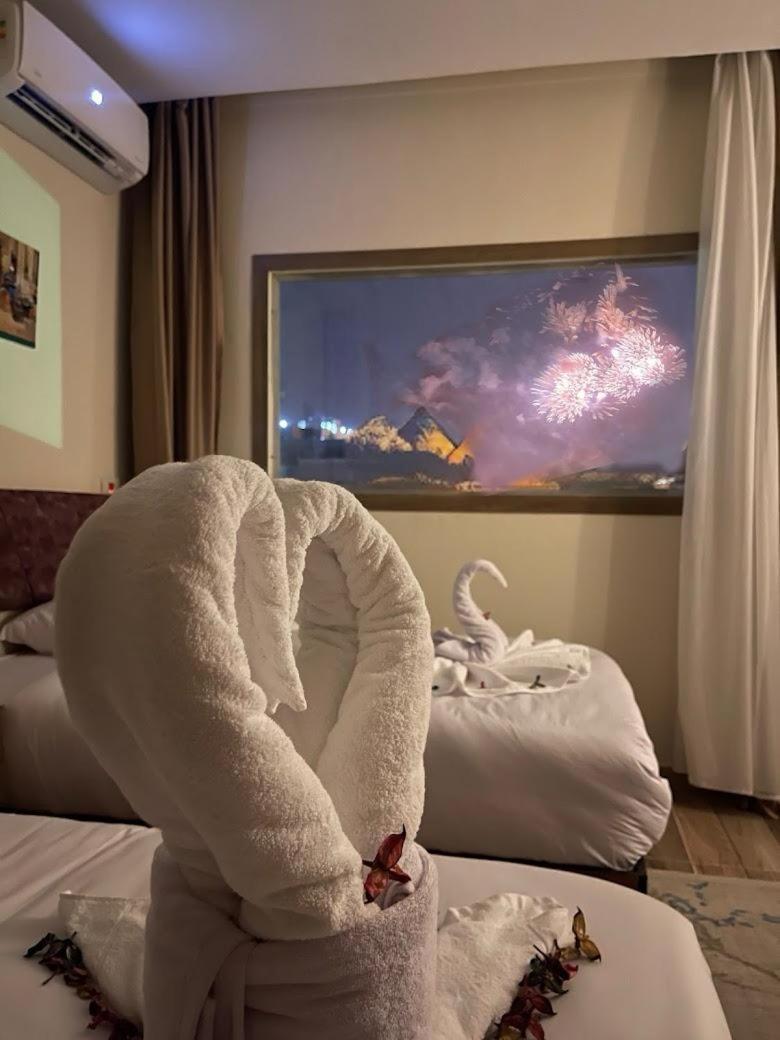 The View Pyramids Hotel Kafret el-Gabal Esterno foto